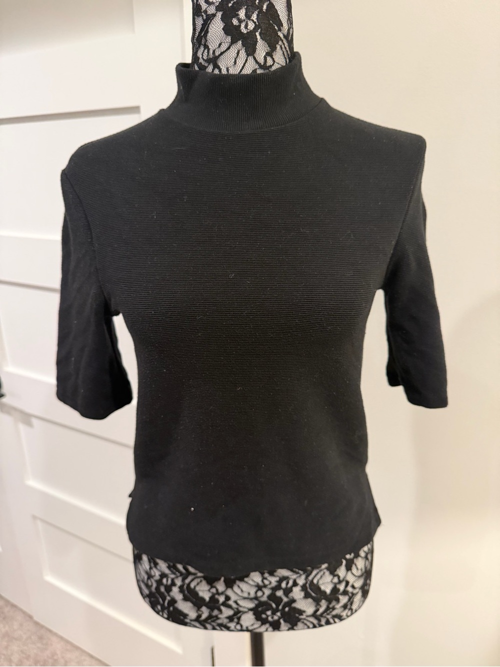 Black mock neck sweater